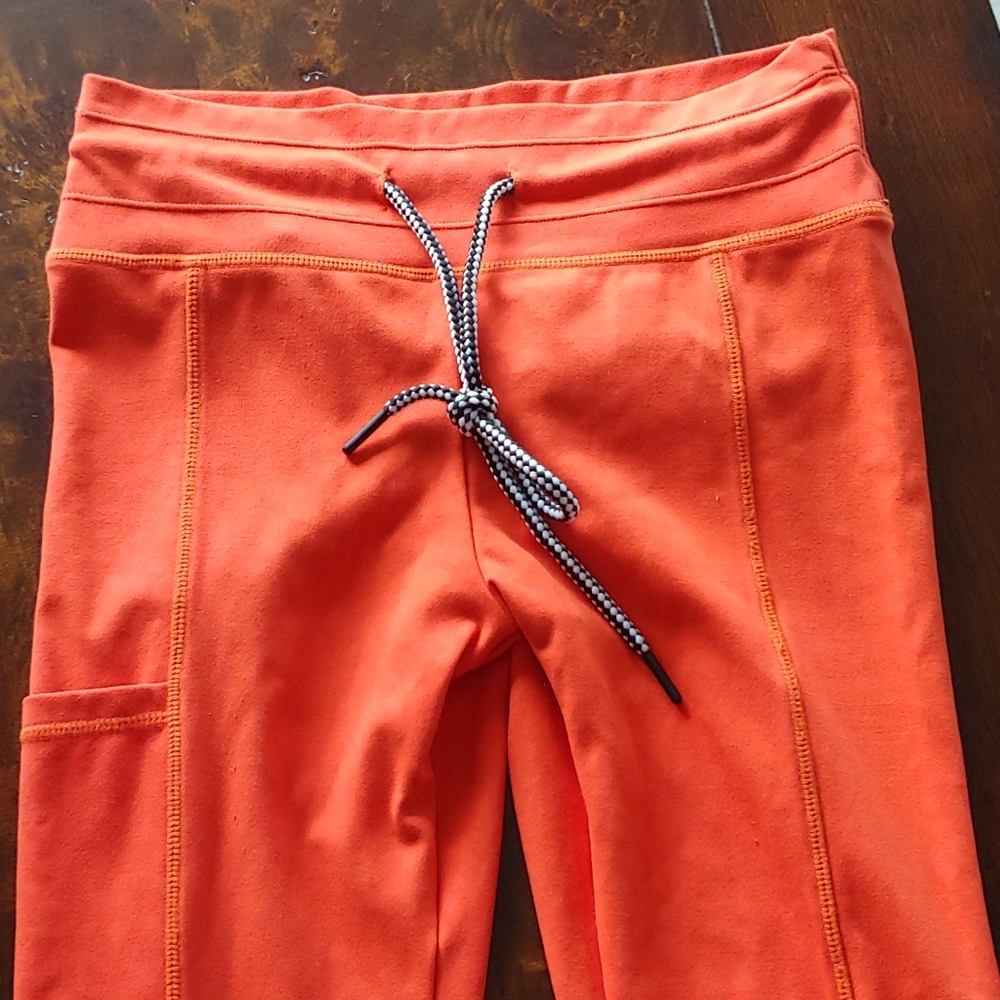 Celestial bodiez orange hybrid leggings